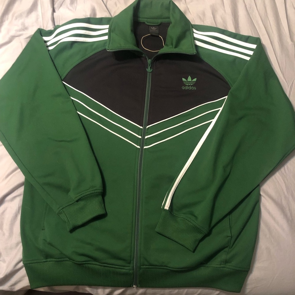 Green adidas jump suit